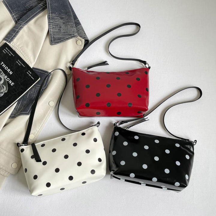 Sleek Polka Dot Handheld Clutch