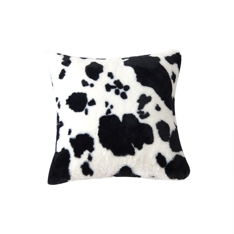 Decorative pillow with cow pattern