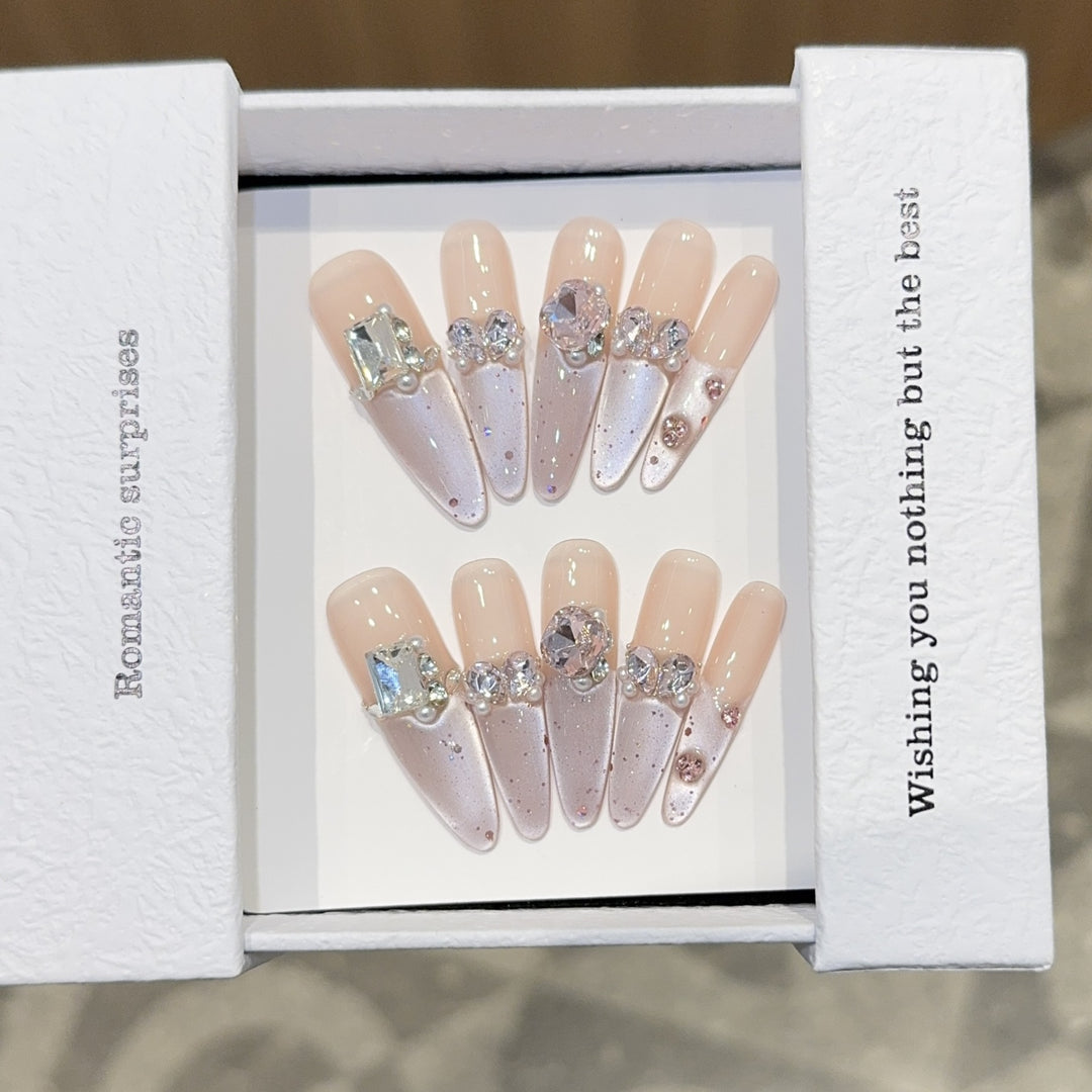 Romantic artificial nails with glitter decoration Stornfield