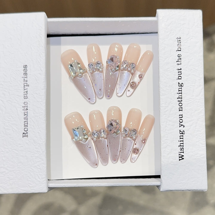 Romantic artificial nails with glitter decoration Stornfield