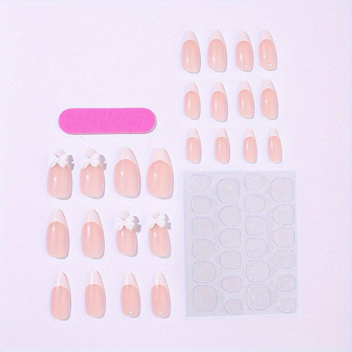 Acrylic nail set with elegant tips and floral accents Stornfield