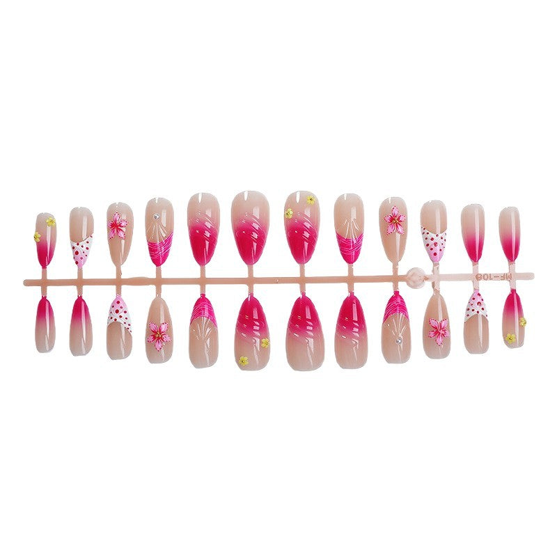 Artful nail tips with delicate floral embellishments Stornfield