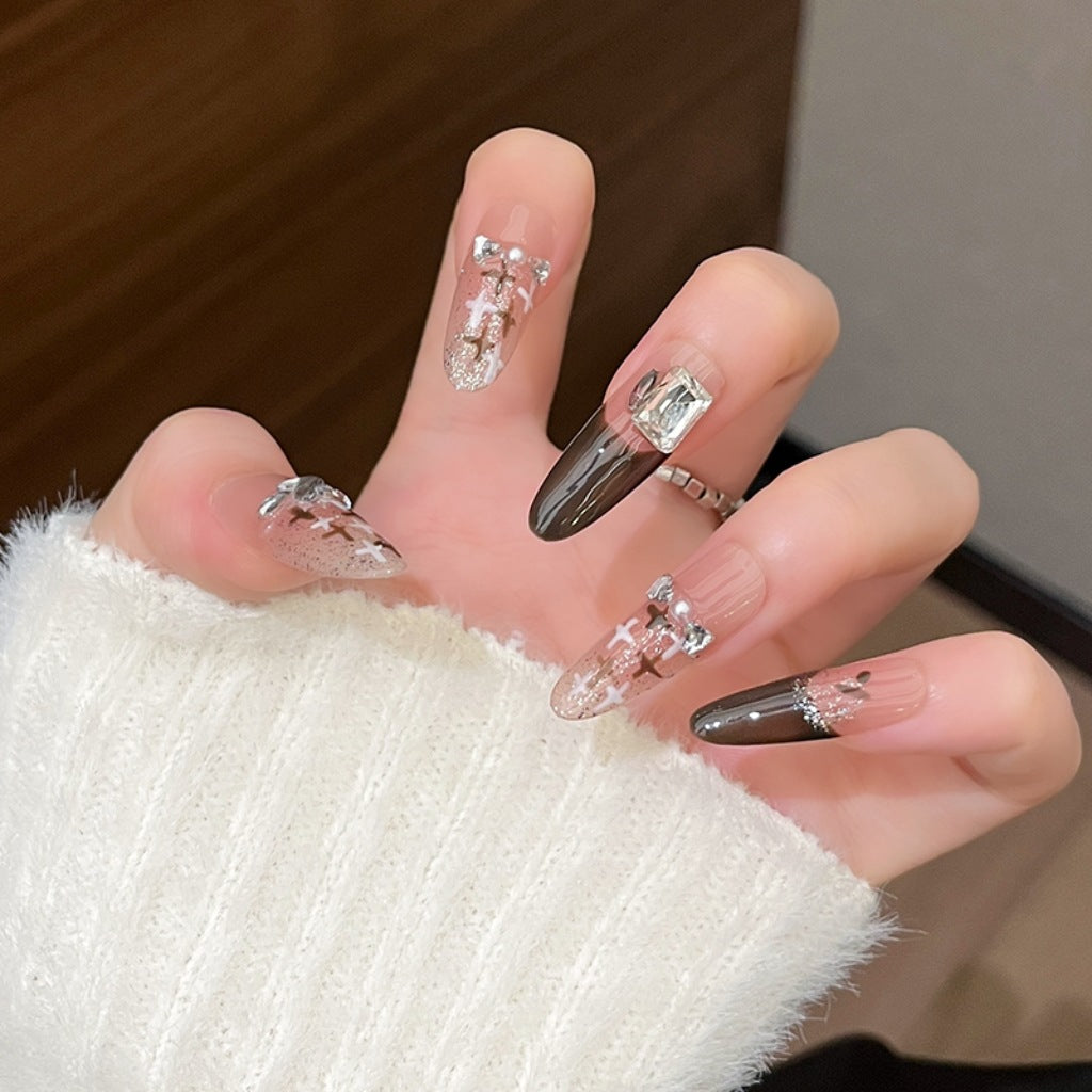 Artistic Stiletto Press-On Nail Art with Glimmering Accents Stornfield