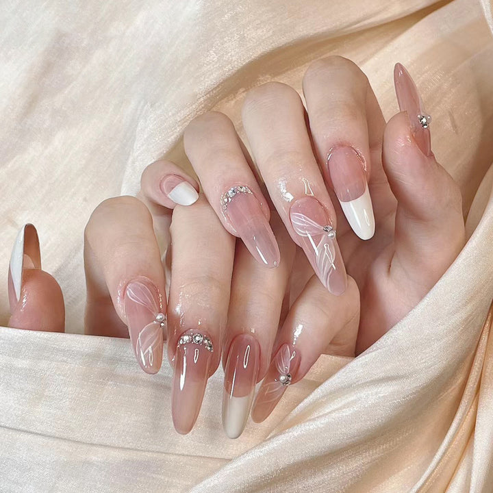 Elegant Long Stiletto Press-On Nails with Floral and Gem Accents Stornfield
