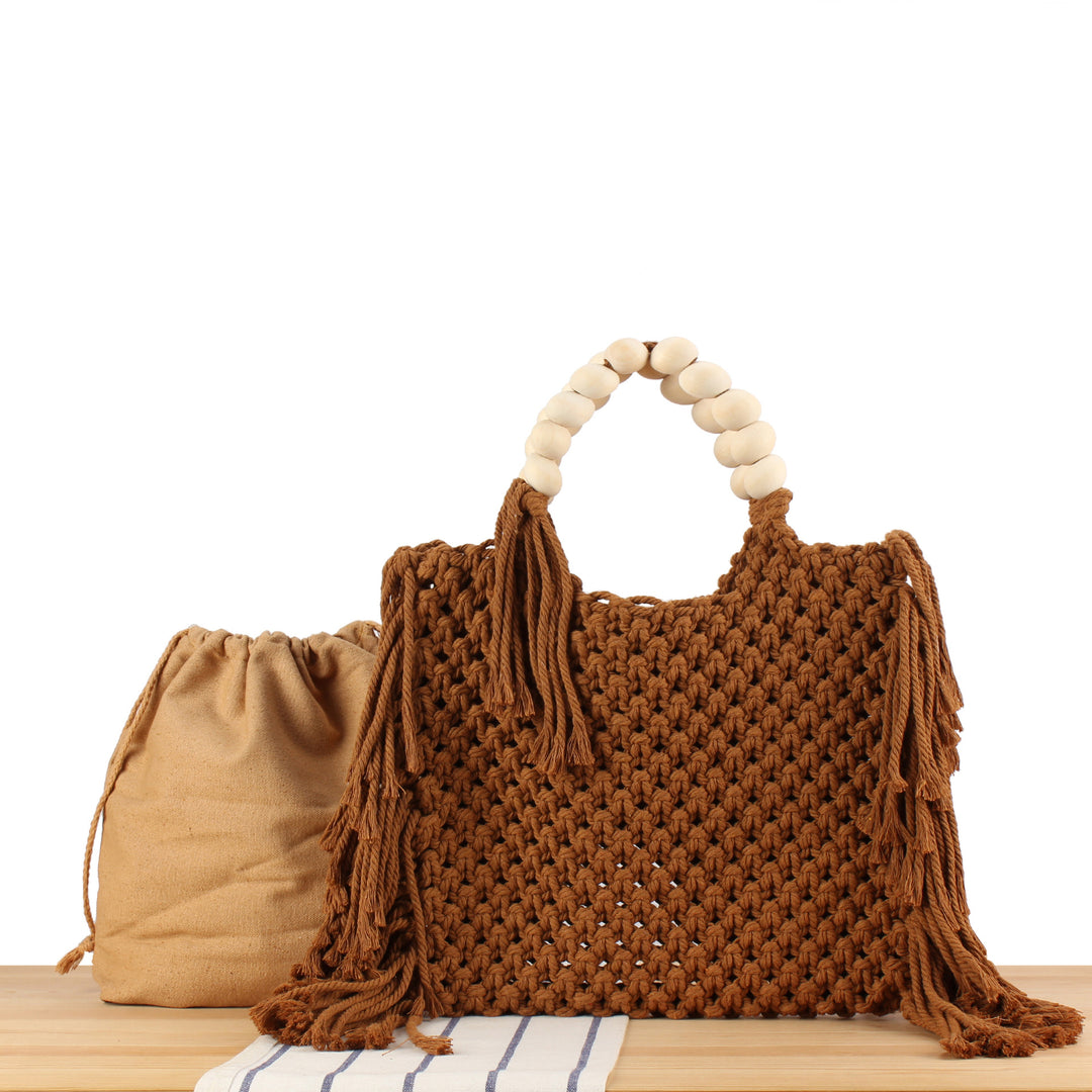 Creative crochet handbag with decorative fringes Stornfield