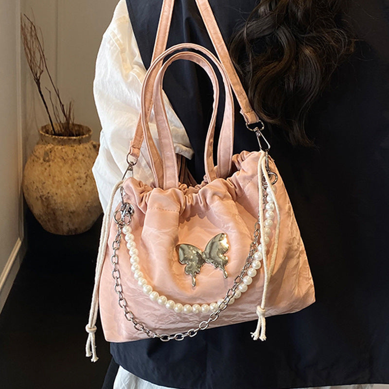 Elegant Pearl-Accented Mini Drawstring Handbag
