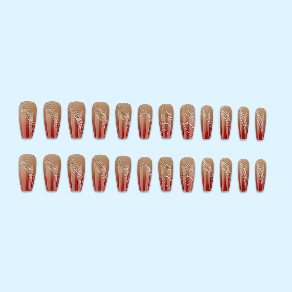 Artificial nails in elegant ombre design with fine lines Stornfield
