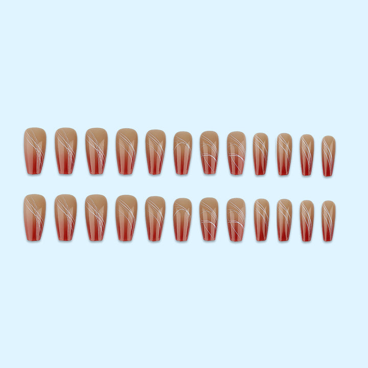 Artificial nails in elegant ombre design with fine lines Stornfield