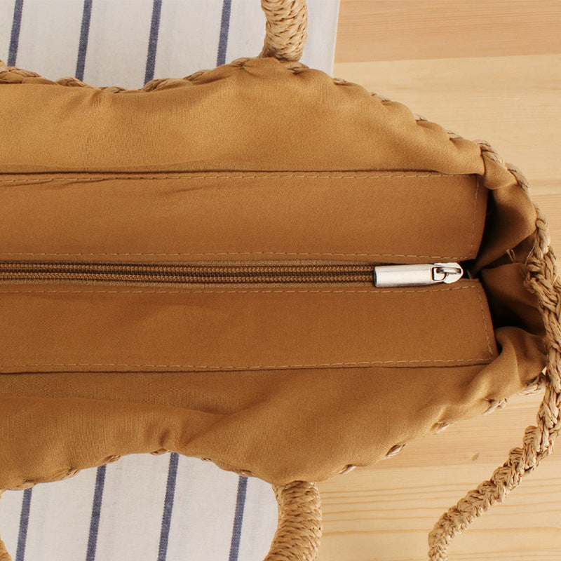 Braided beach bag with round handles Stornfield