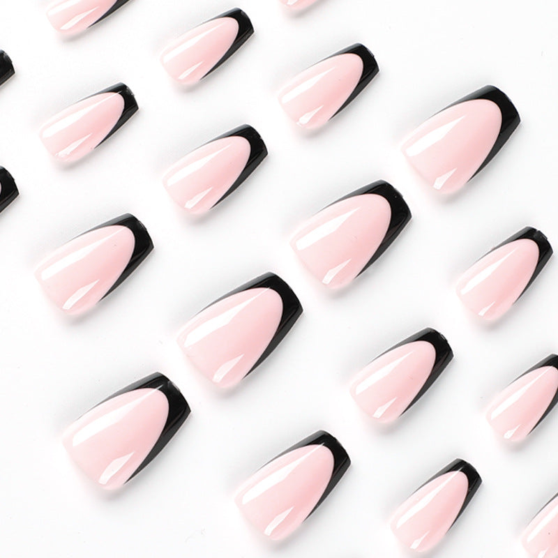 Elegant stiletto nails with contrasting French tip Stornfield