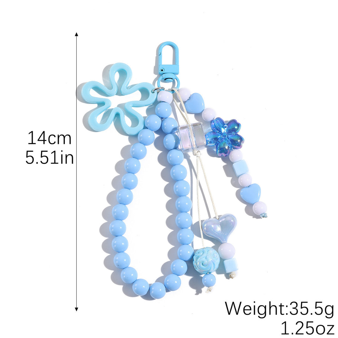 Playful keychain with flower and butterfly details Stornfield