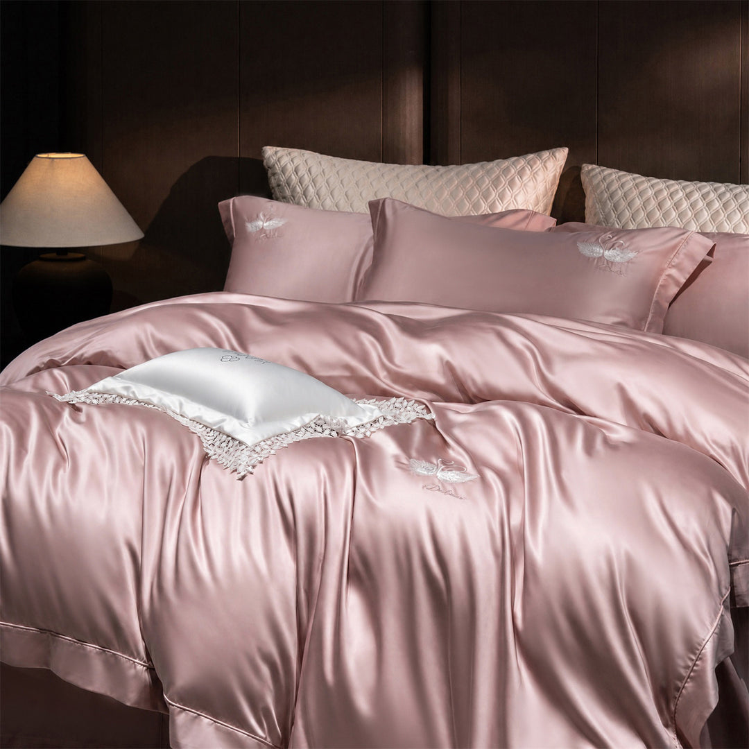 Luxurious satin bedding set with embroidered swan motif and lace pillow