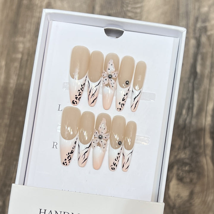 Artistic Stiletto Nail Art Set with Elegant Decorative Elements Stornfield