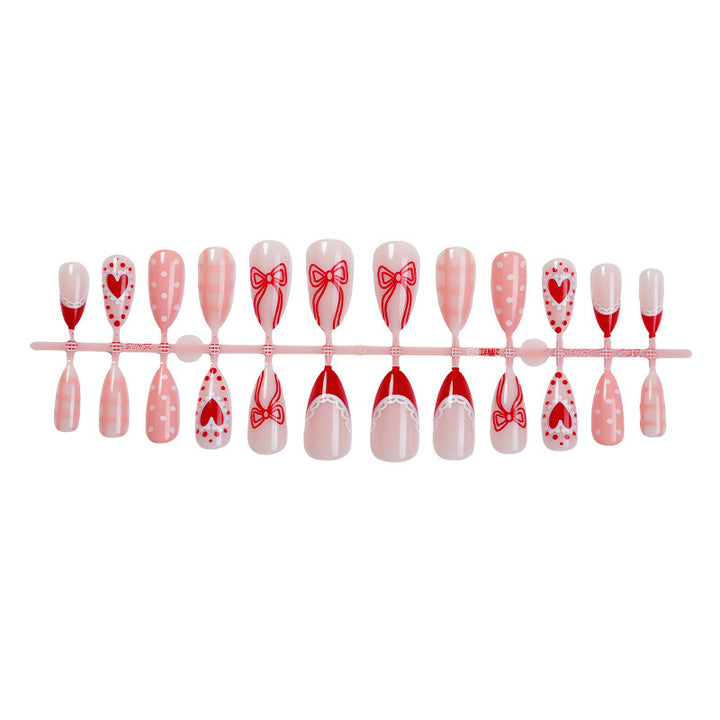 Creative Nail Art Set with Romantic Bow, Heart, and Dot Designs Stornfield