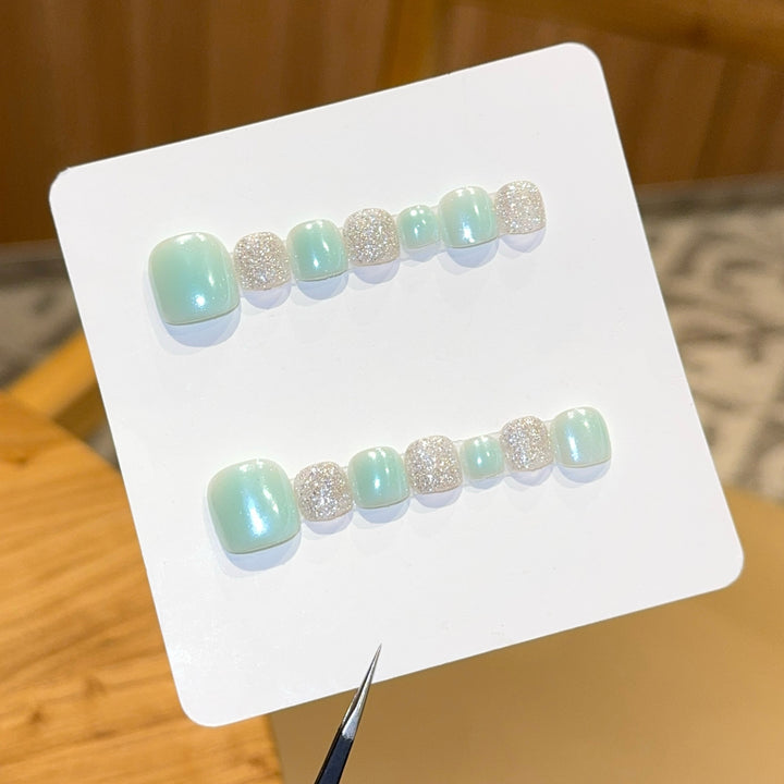 Acrylic nail set with glitter and pastel accent Stornfield