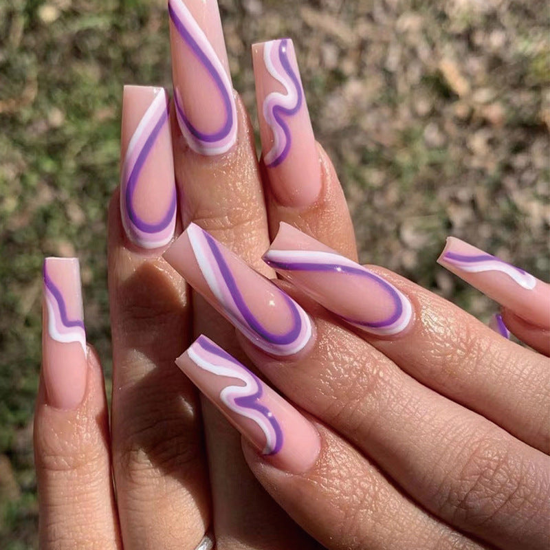 Artful nail extensions with elegant wave pattern Stornfield