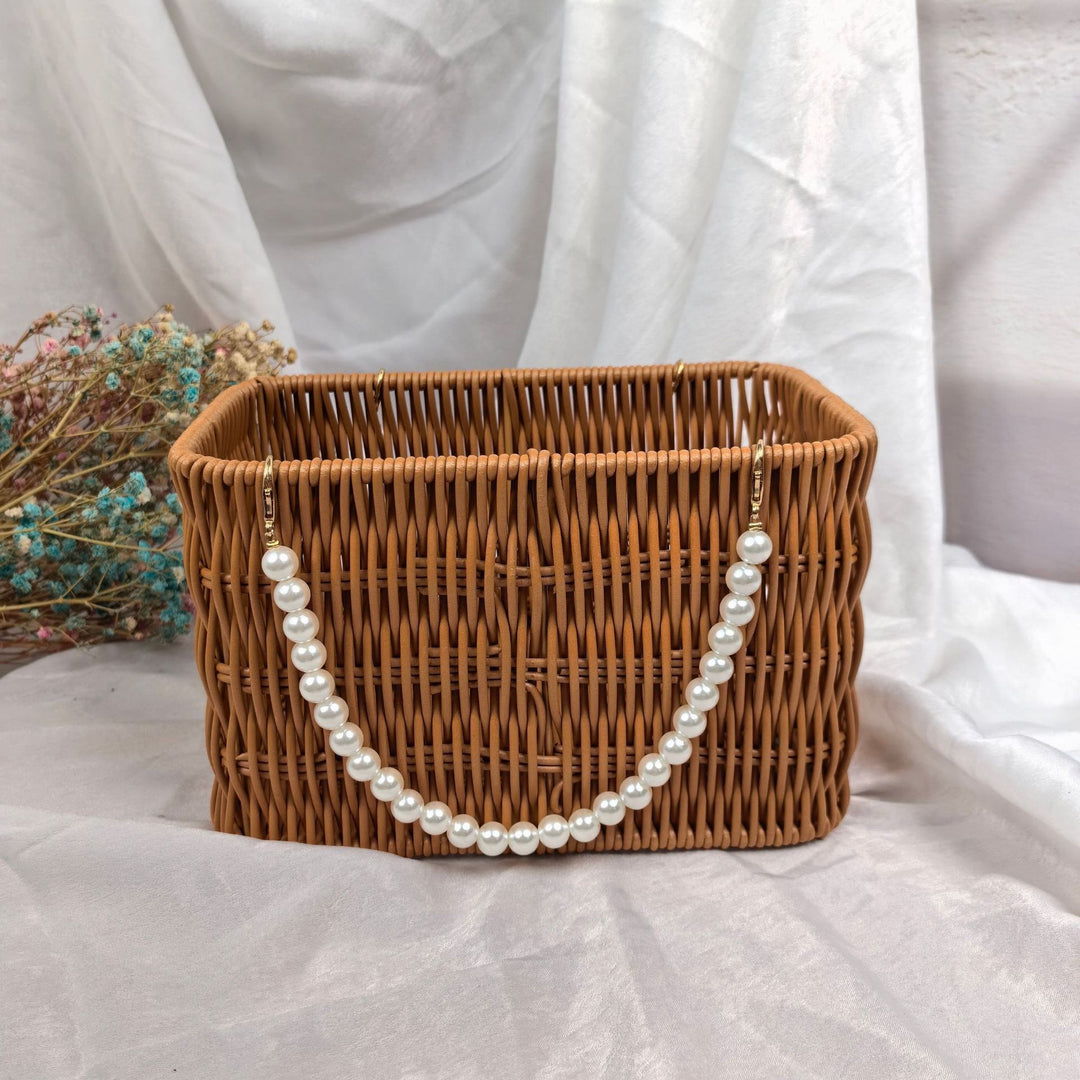Women's stylish rattan container with pearl handle Stornfield