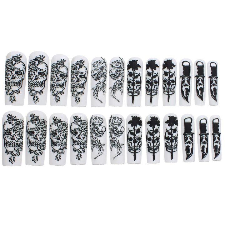 Nail set with spooky skull design and floral motifs Stornfield