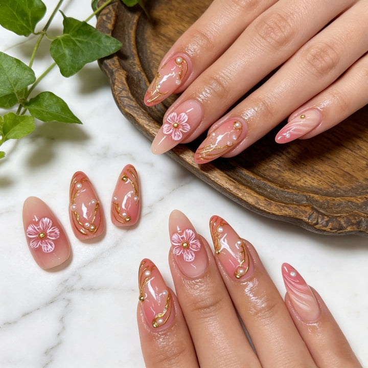 Artificial nails with floral decorations and gold accents Stornfield