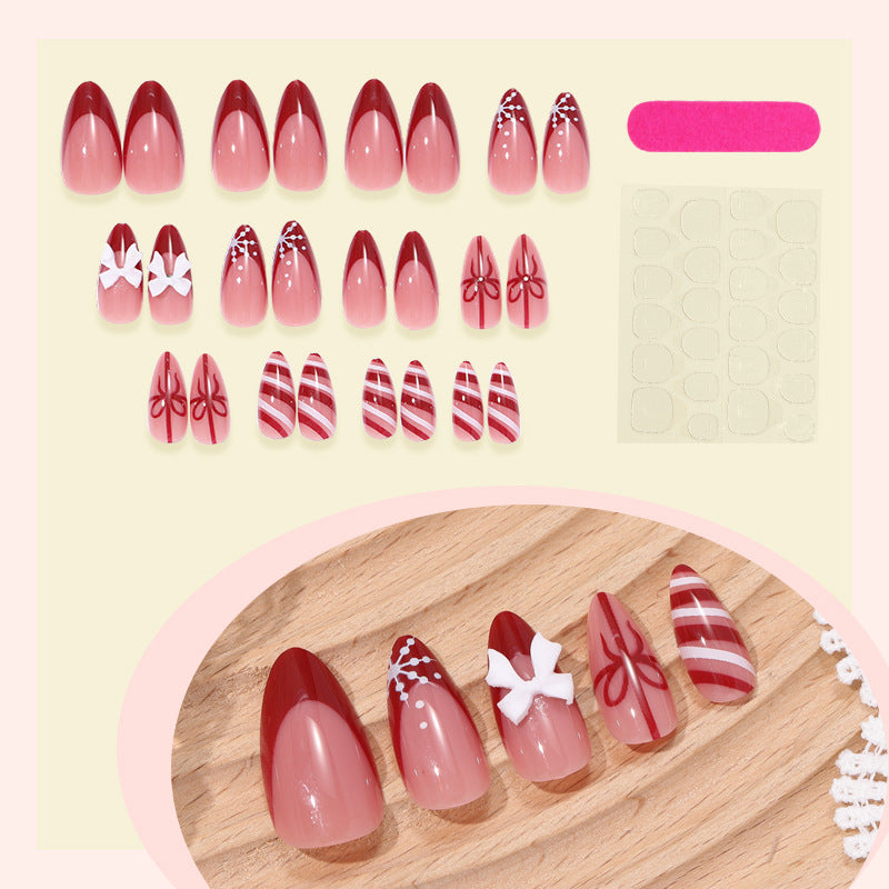 Decorative Press-On Nail Set with Elegant Bow and Striped Designs Stornfield