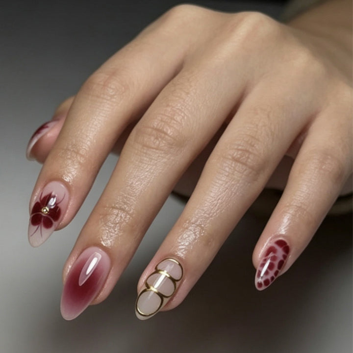 Artificial nails with elaborate flower designs and elegant accents Stornfield