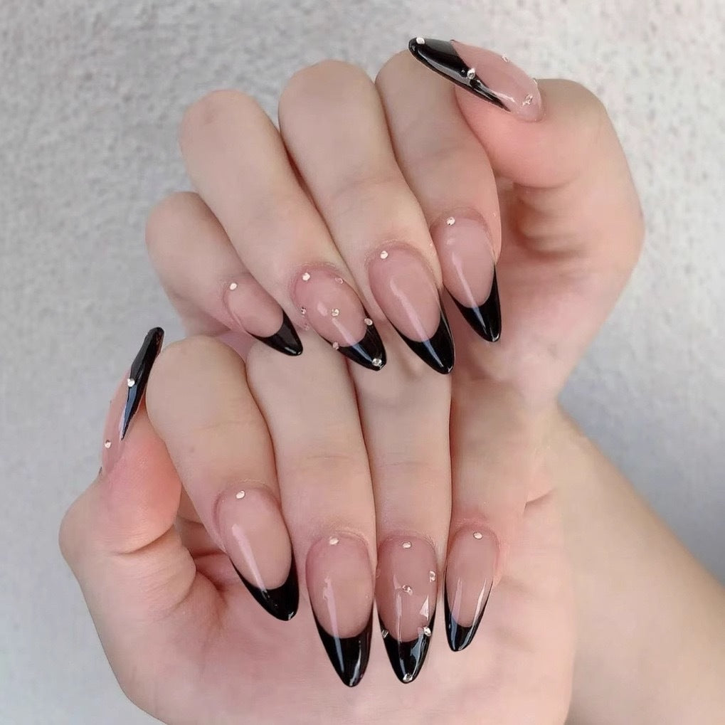 Artificial nail tips with elegant French design and glamorous details Stornfield