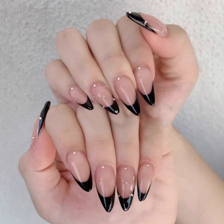 Artificial nail tips with elegant French design and glamorous details Stornfield