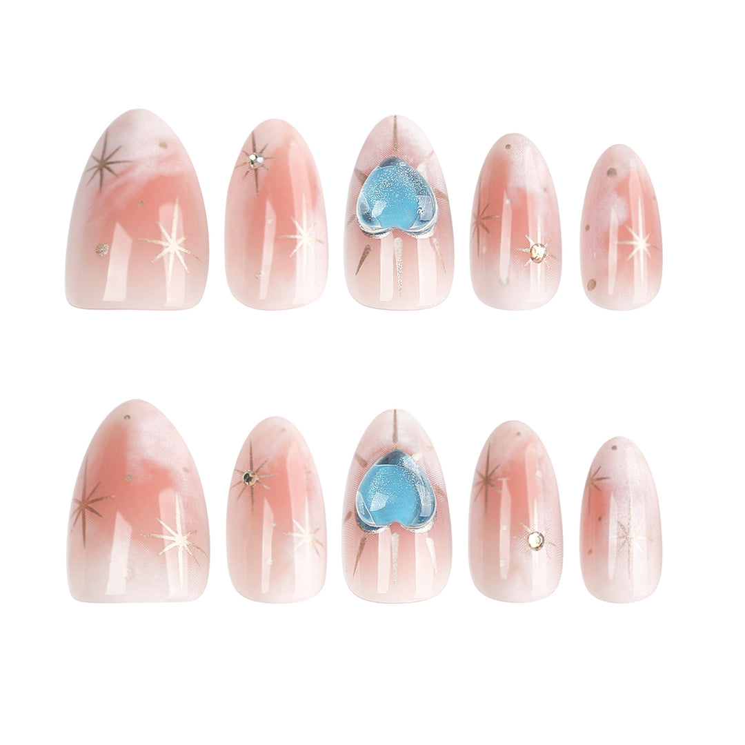 Nail design with decorative hearts and glitter accents Stornfield