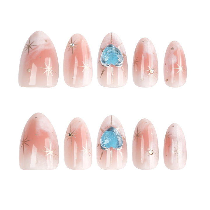 Nail design with decorative hearts and glitter accents Stornfield