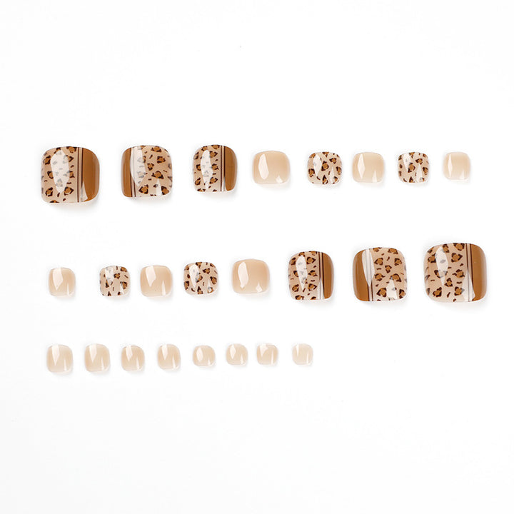 Artful toenail design with leopard pattern and modern lines Stornfield