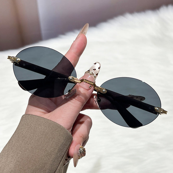 Ladies fashionable and elegant sunglasses with oval design Stornfield