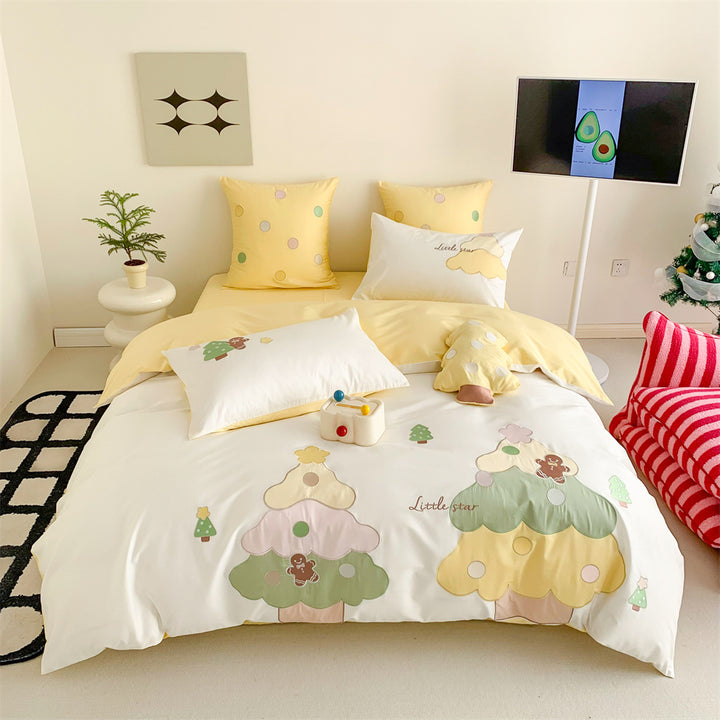 Children's bedding set with playful tree appliqués and soft pillowcases