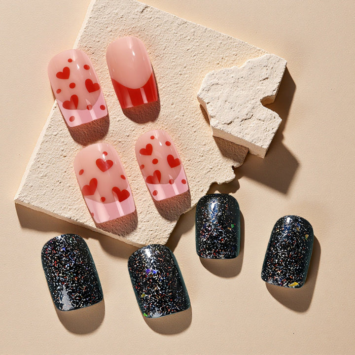 Creative artificial nails with heart design and glitter effects Stornfield