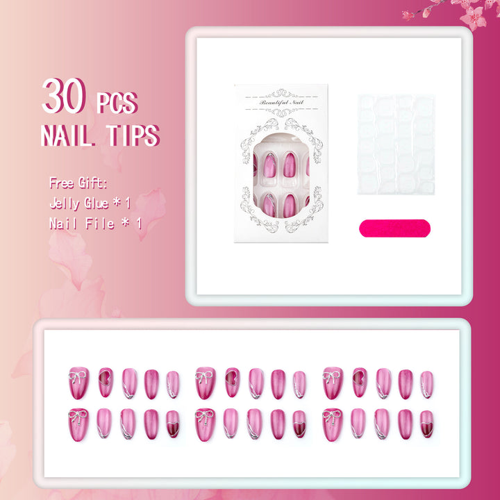 Acrylic nail set with elegant heart and bow decorations Stornfield