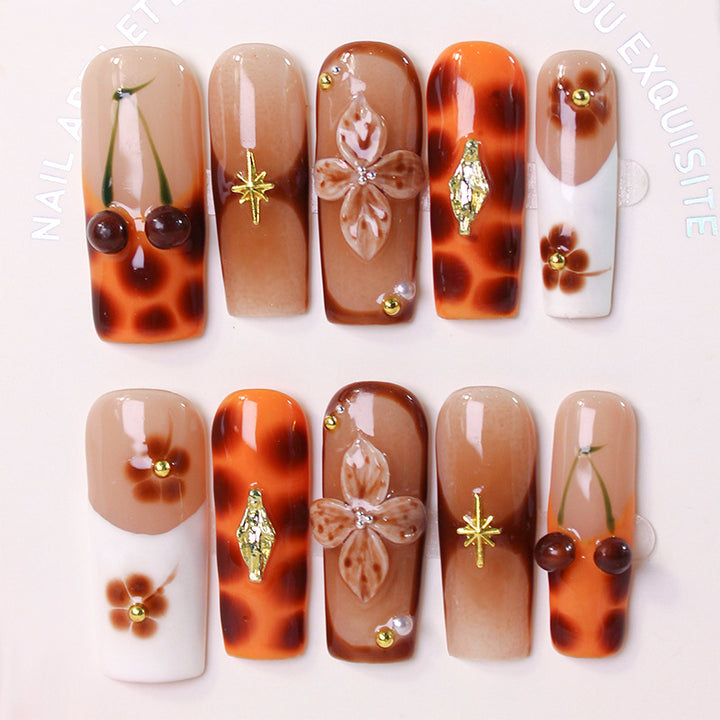 Acrylic nail set with luxurious decorations and stylish accents Stornfield