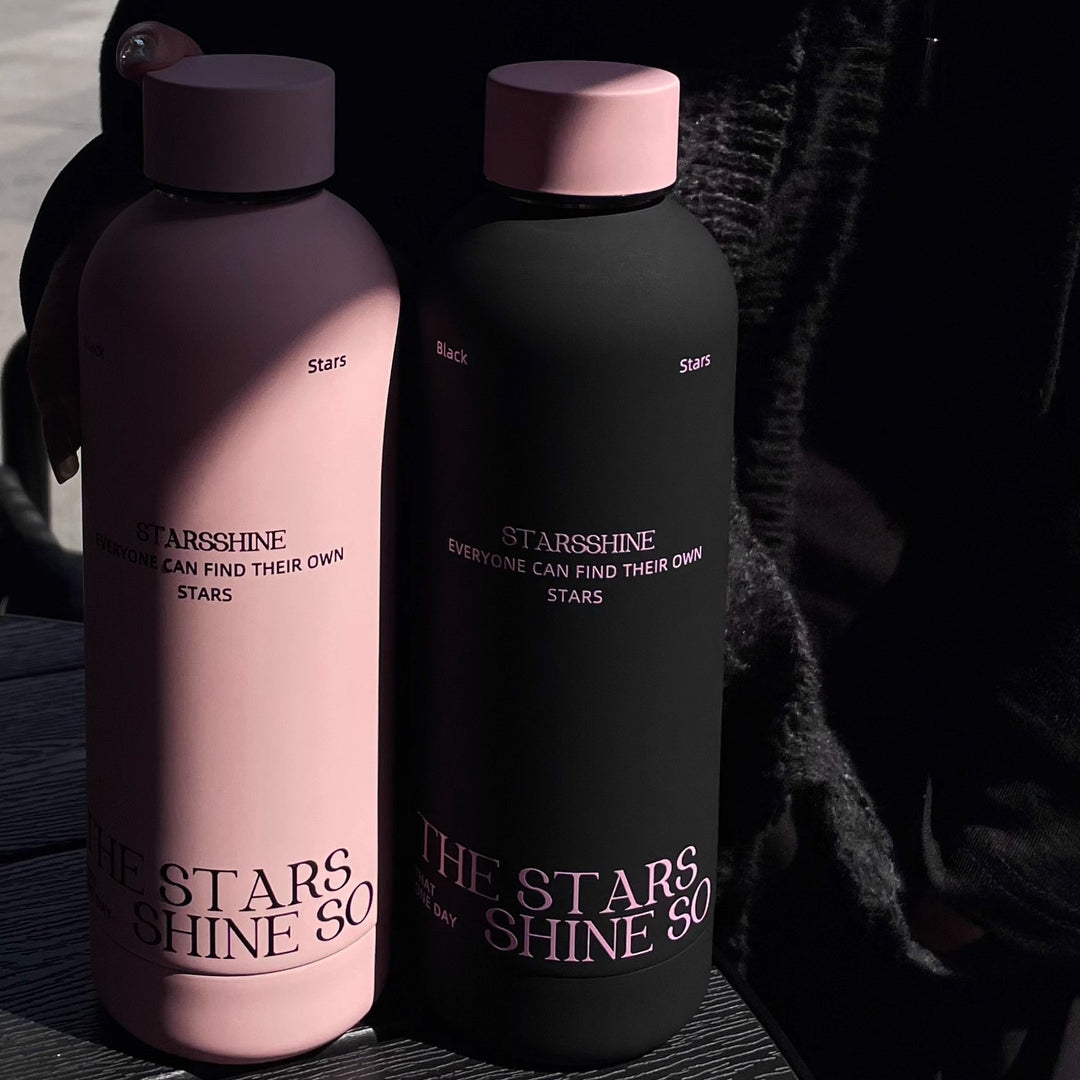 Women's insulated bottle with ergonomic design and practical carrying strap Stornfield