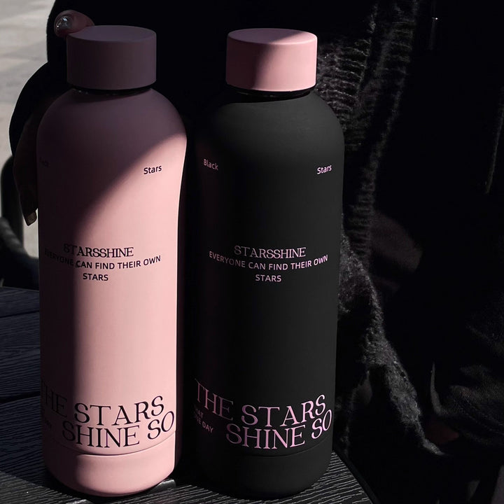 Women's insulated bottle with ergonomic design and practical carrying strap Stornfield