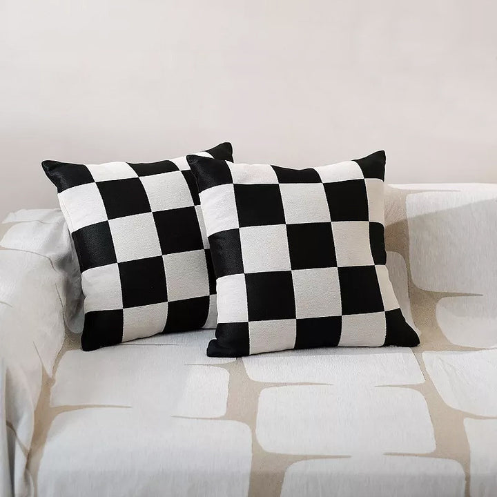 Square decorative cushion with woven checkered pattern and hidden zipper