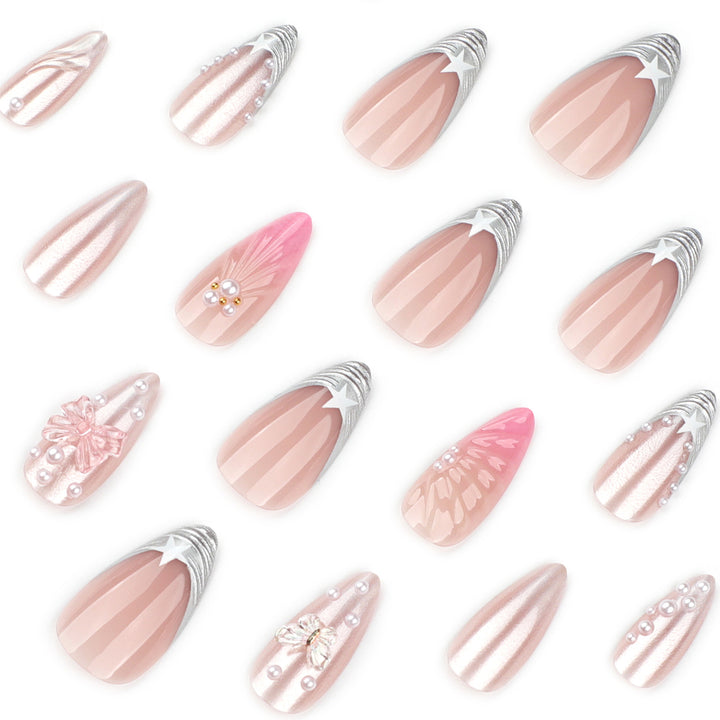 Artful stiletto nails with floral and glitter accents Stornfield