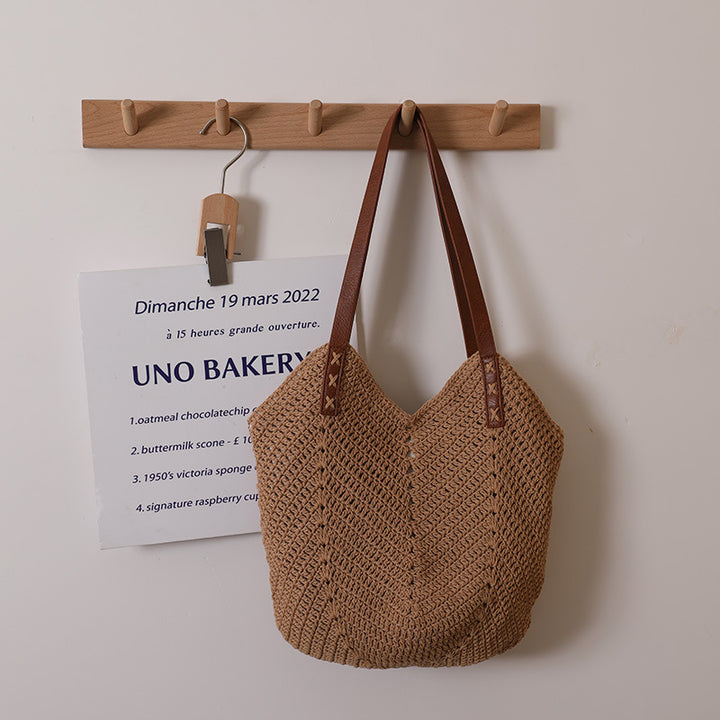 Handcrafted wicker bag with sturdy leather handles Stornfield