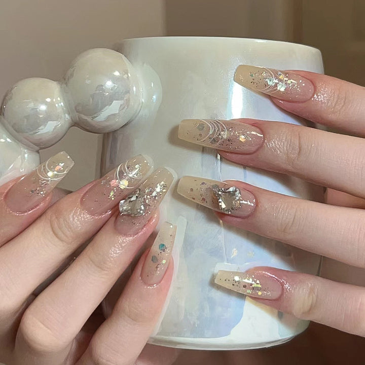 Elegant nail extensions with glitter and flower design Stornfield