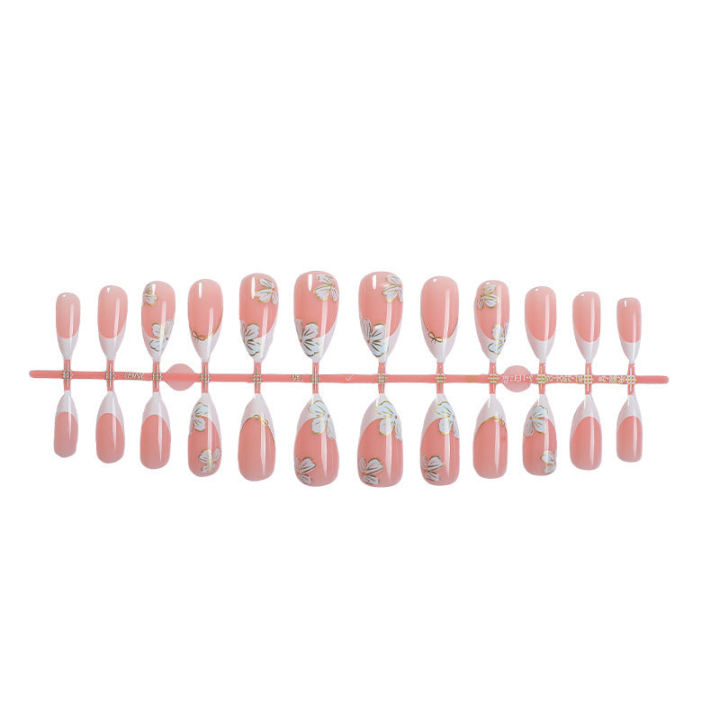 Artificial nail set with elegant flower and French tip design Stornfield