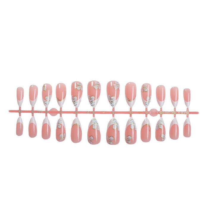 Artificial nail set with elegant flower and French tip design Stornfield