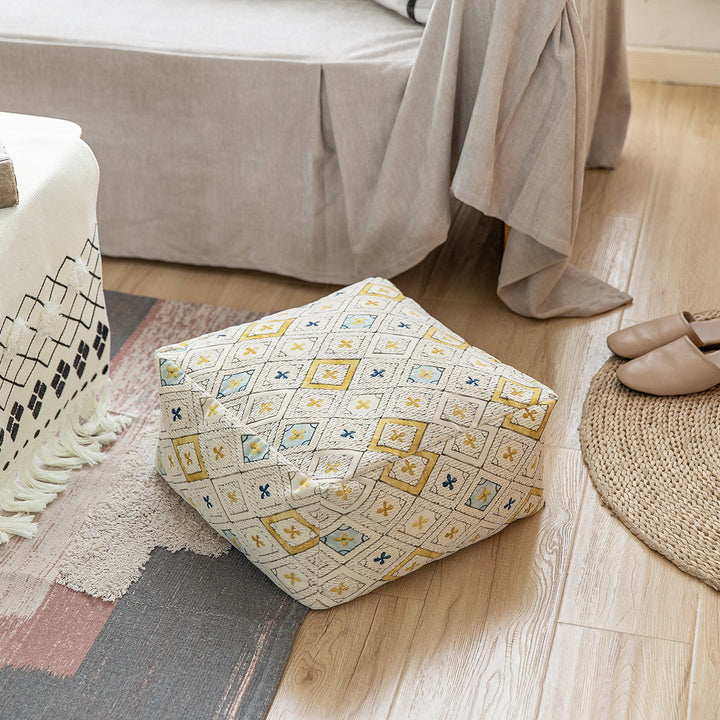 Seating pouf made of woven cotton blend with quilted diamond relief Stornfield