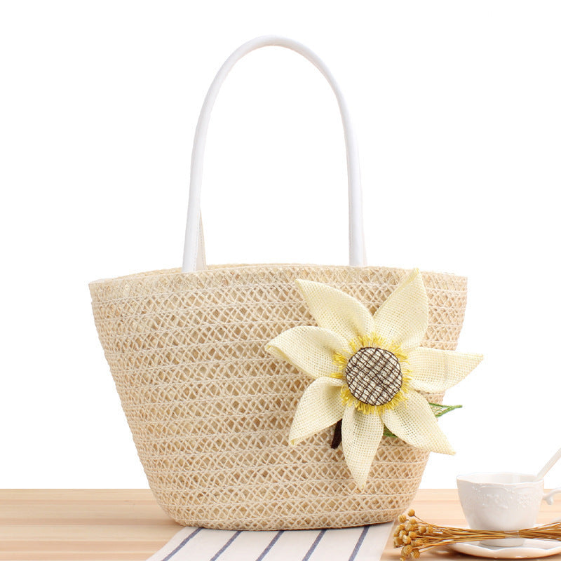 Handbag with floral appliqué Made of natural material Stornfield