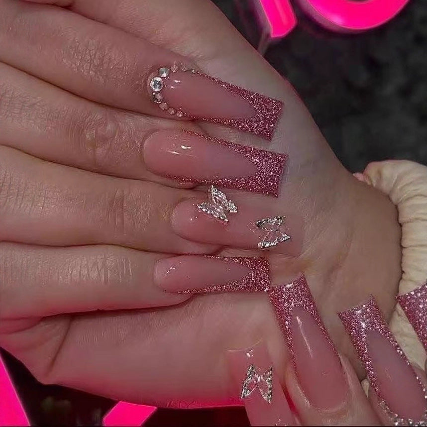 Nail art set with sparkling hearts and elegant glitter accents Stornfield