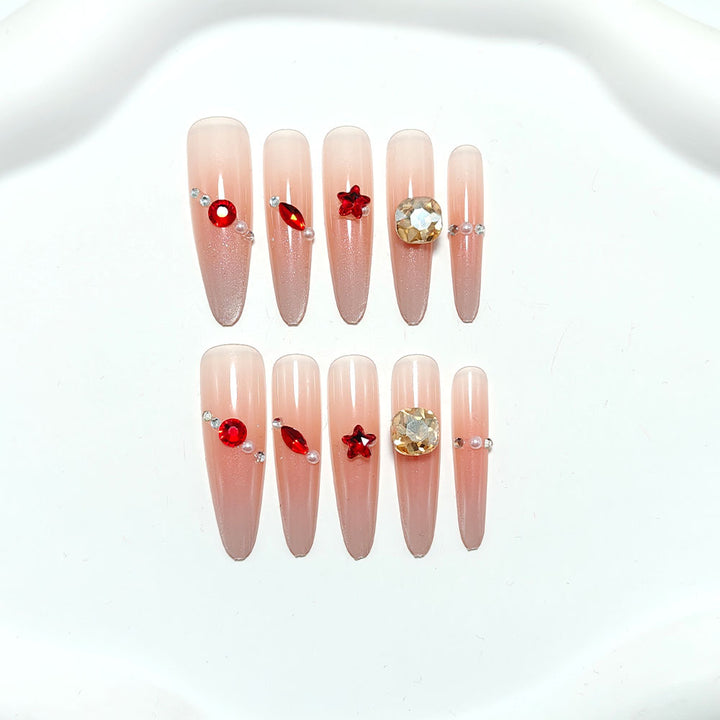Sparkling artificial nails with decorative rhinestones Stornfield