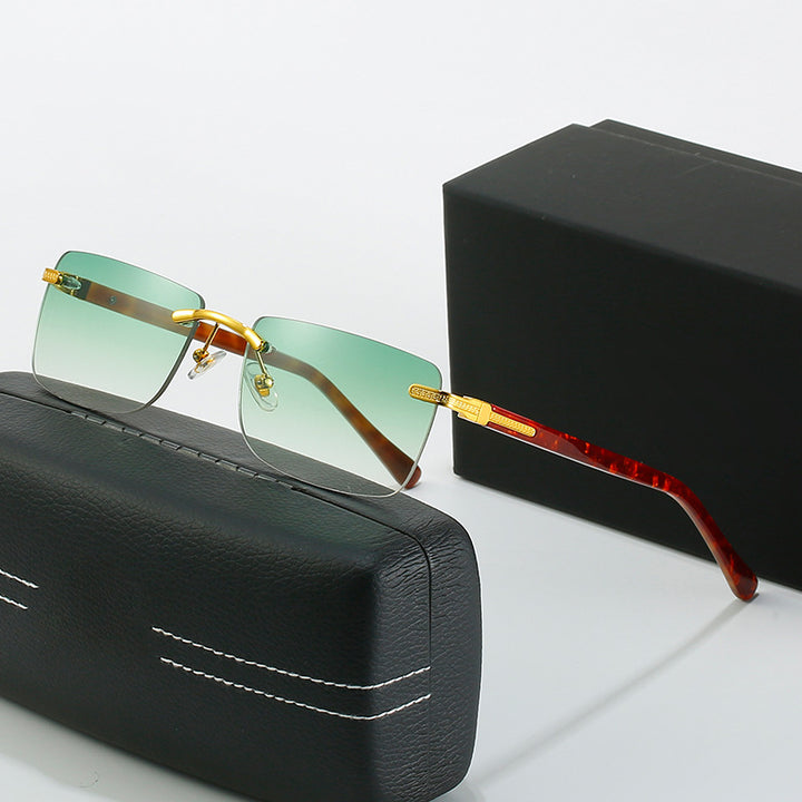 Women's fashionable sunglasses with a stylish, rectangular frame and elegant metal accents Stornfield
