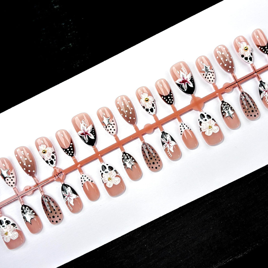 Artistic Press-On Nail Art Set with Unique Floral and Star Designs