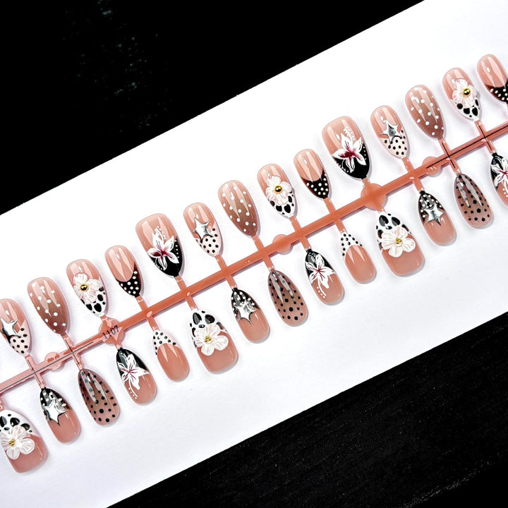 Artistic Press-On Nail Art Set with Unique Floral and Star Designs